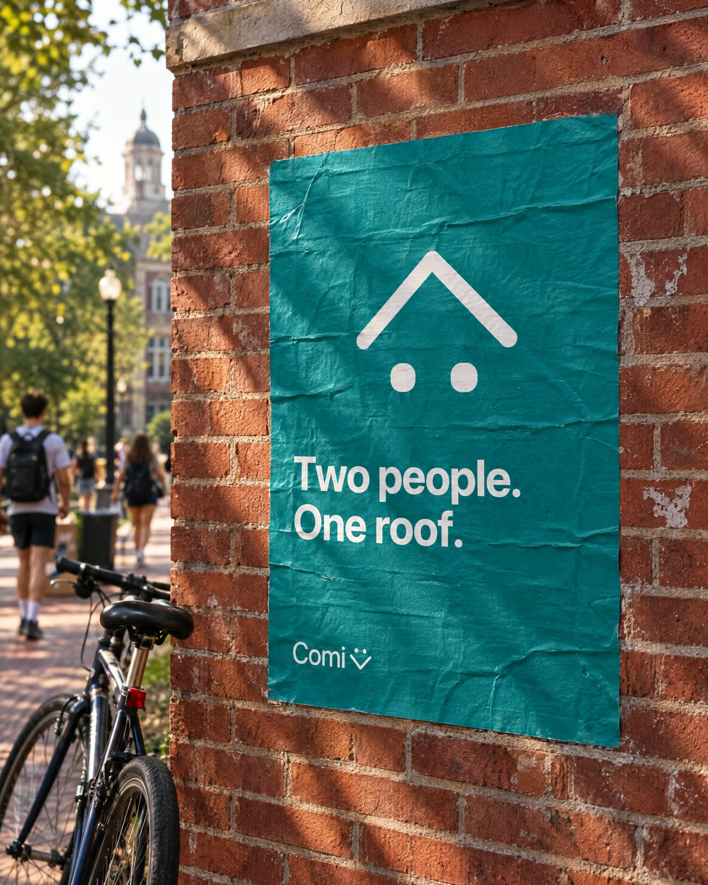 Two people. One roof. poster pasted on a campus brick wall
