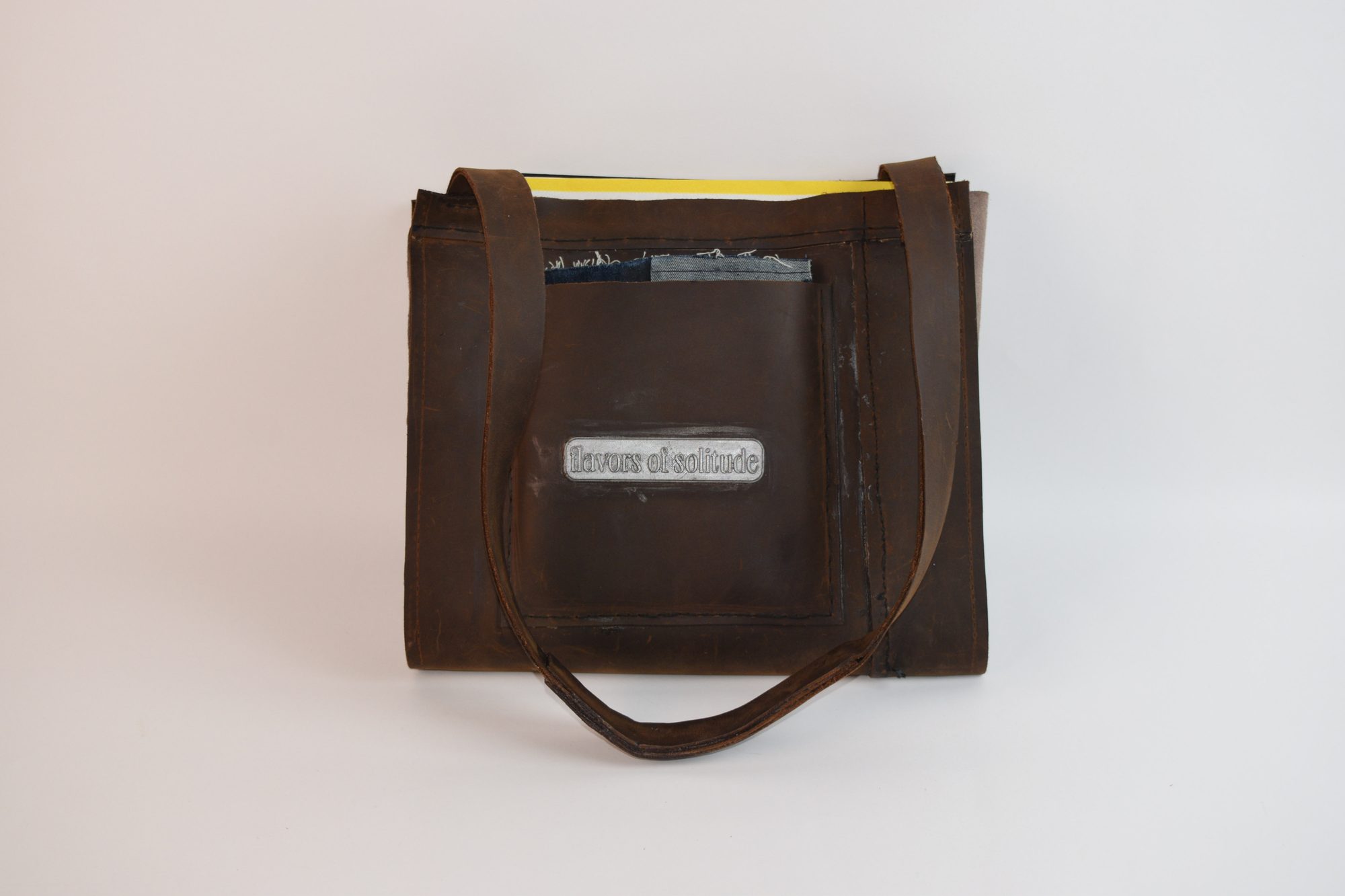 Flavors of Solitude — leather record bag, front view