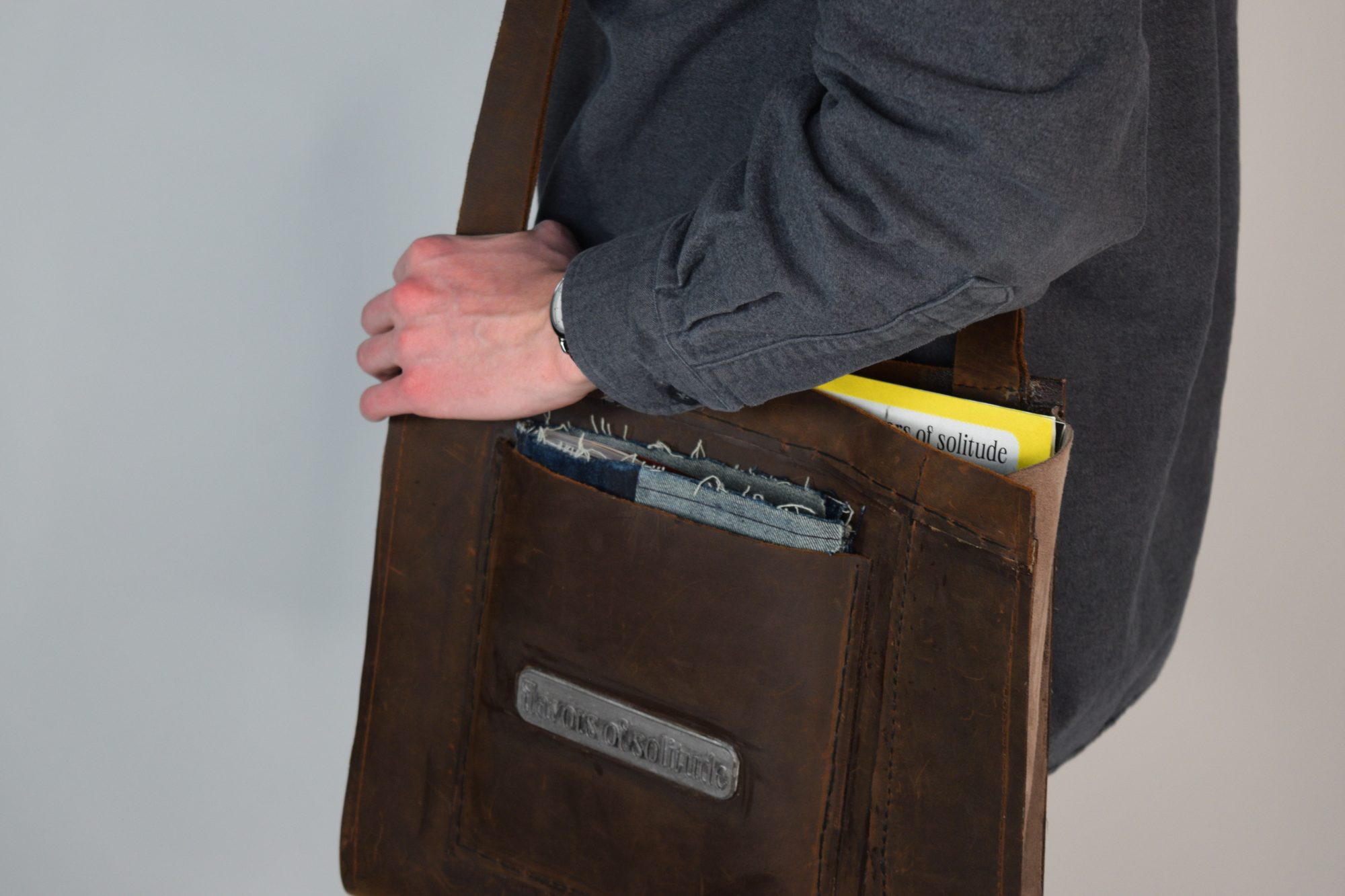 Flavors of Solitude — leather bag, stitching and material detail