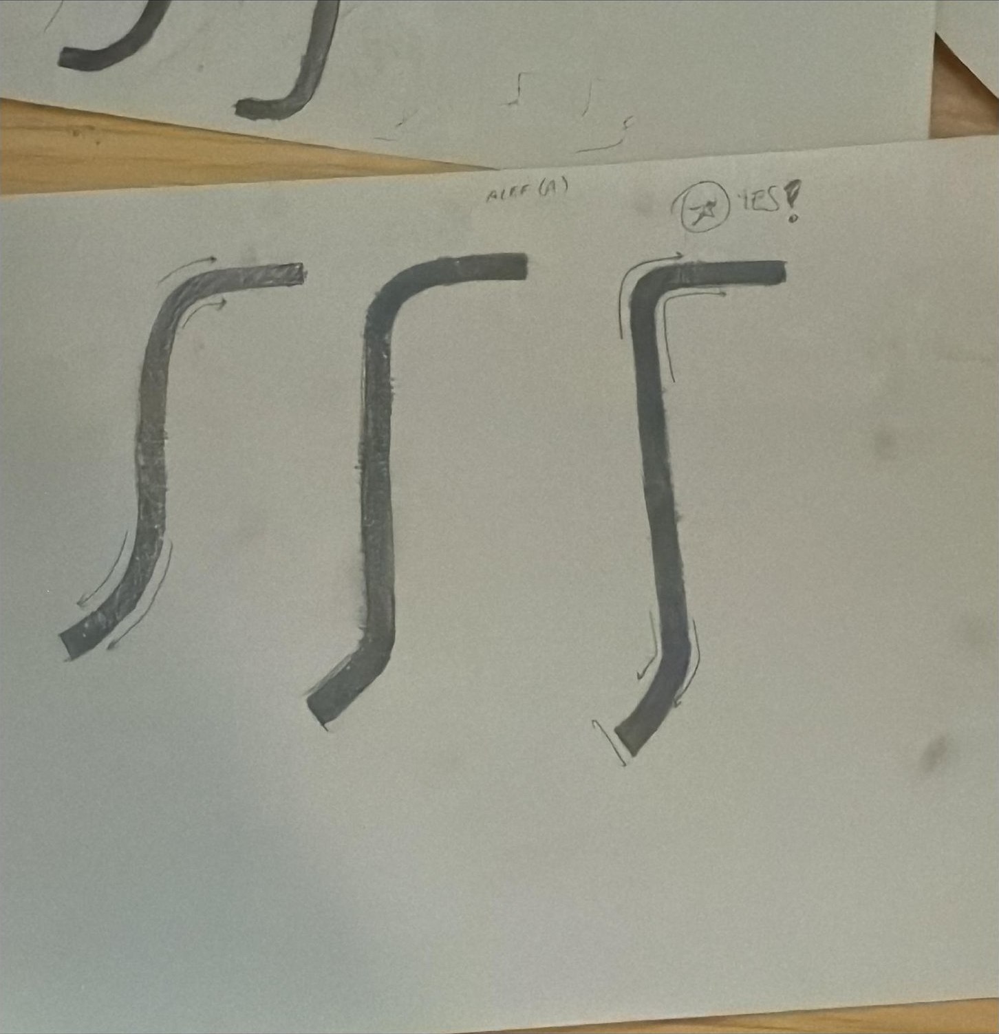 Analog sketches — brush strokes exploring the hook forms