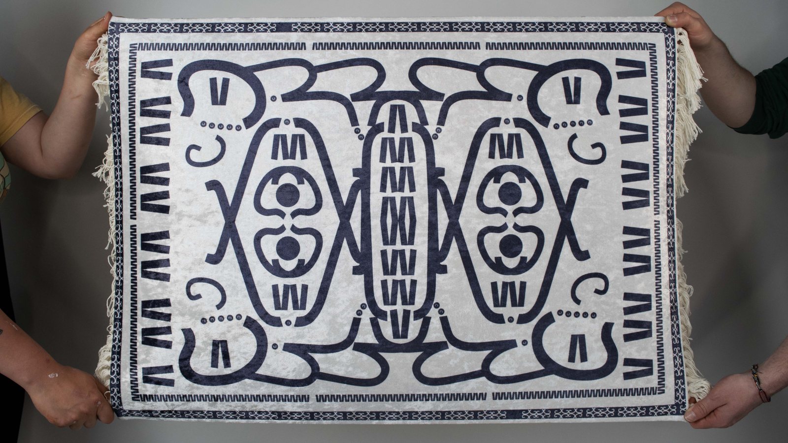 The Ganchos rug held out flat